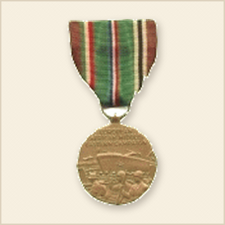 European African Middle Eastern Campaign Medal.  Authorized on 6 November 1942, for members of the United States Armed Forces for service in this these theaters between 7 December 1941 to 8 November 1945.