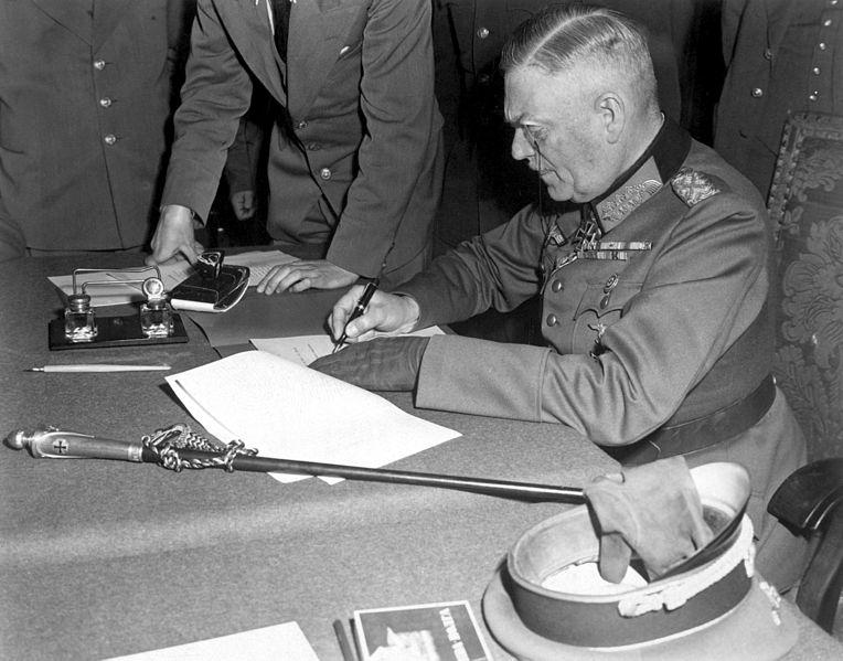 Wilhel Keitel signs the surrender of Germany
