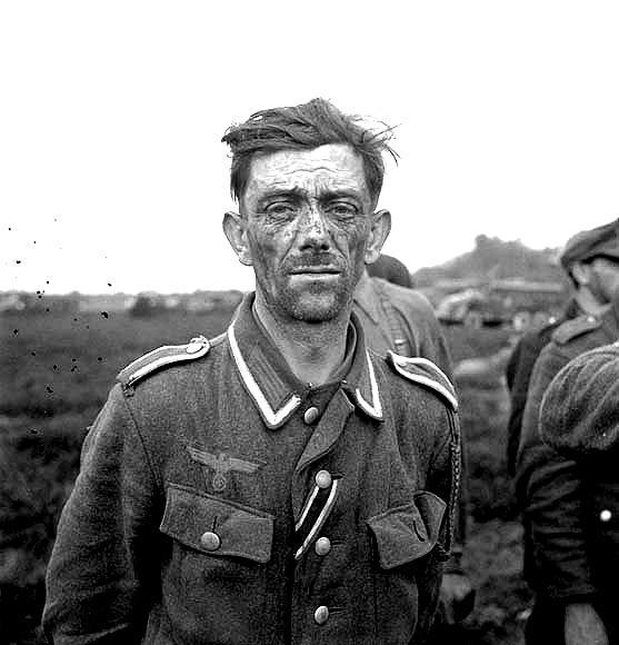 5th Canadian (Armoured) Division and a Jerry prisoner