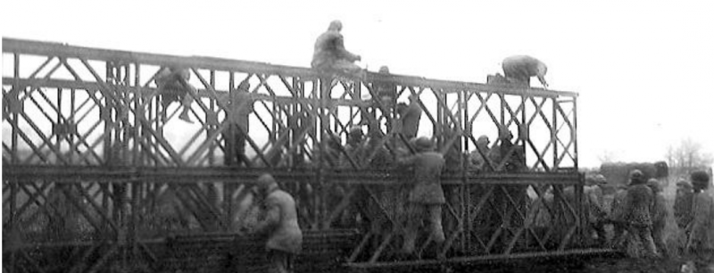 324th Engineer Combat Battalion building Baily bridge at the Erft Canal