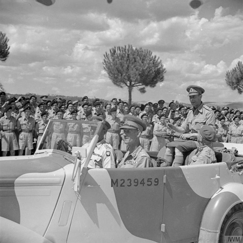 HM King George VI, accompanied by Generals Leese and McCreery