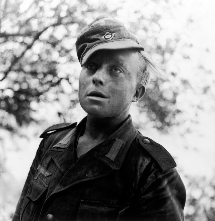 Photo by Robert Capa, German soldier captured by American forces