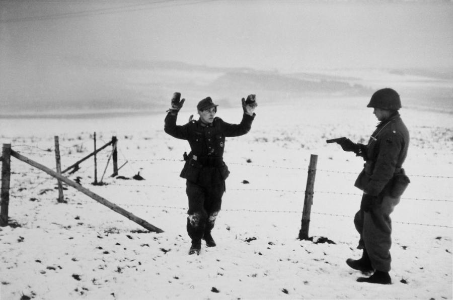 Photo by Robert Capa, US soldier with a German prisoner